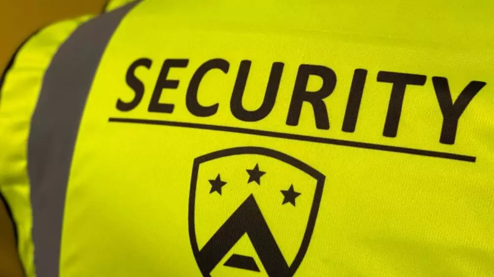 Security guard job wearing an alpha crew high vis