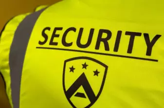 Security guard job wearing an alpha crew high vis